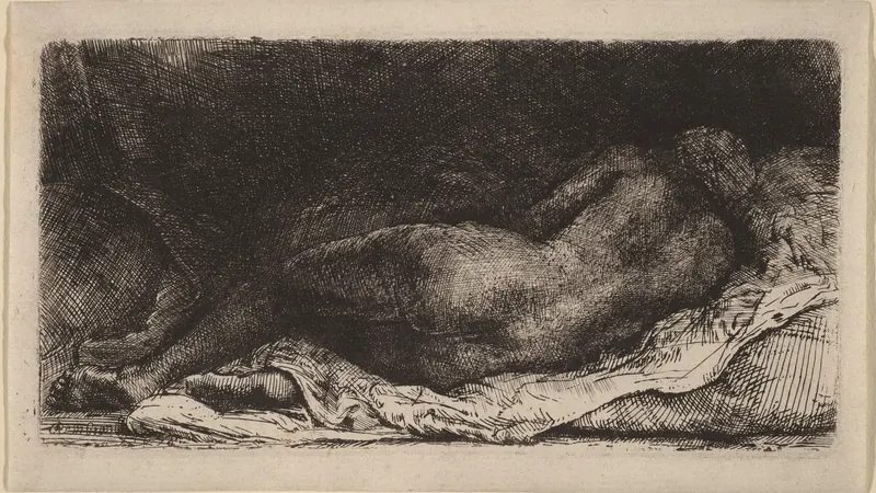 Reclining Female Nude by Rembrandt van Rijn